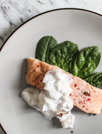 salmon with spinach, pink peppercorn, rhubarb yogurt sauce