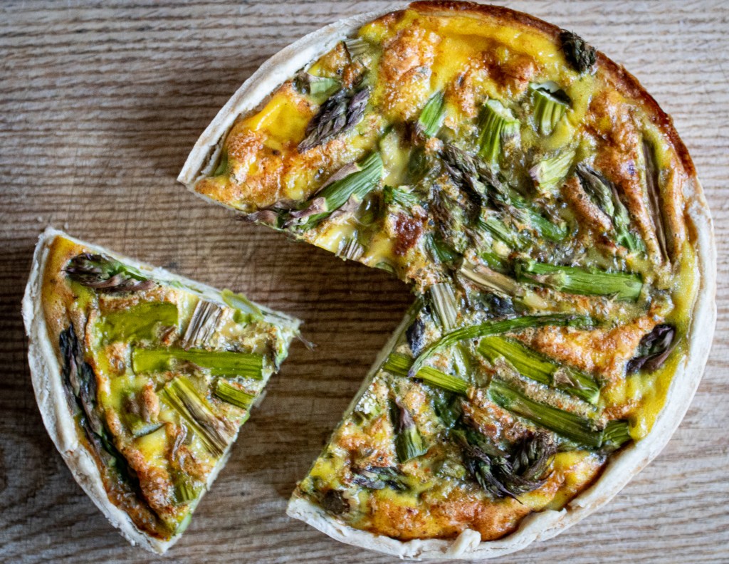 asparagus quiche with slice cut out