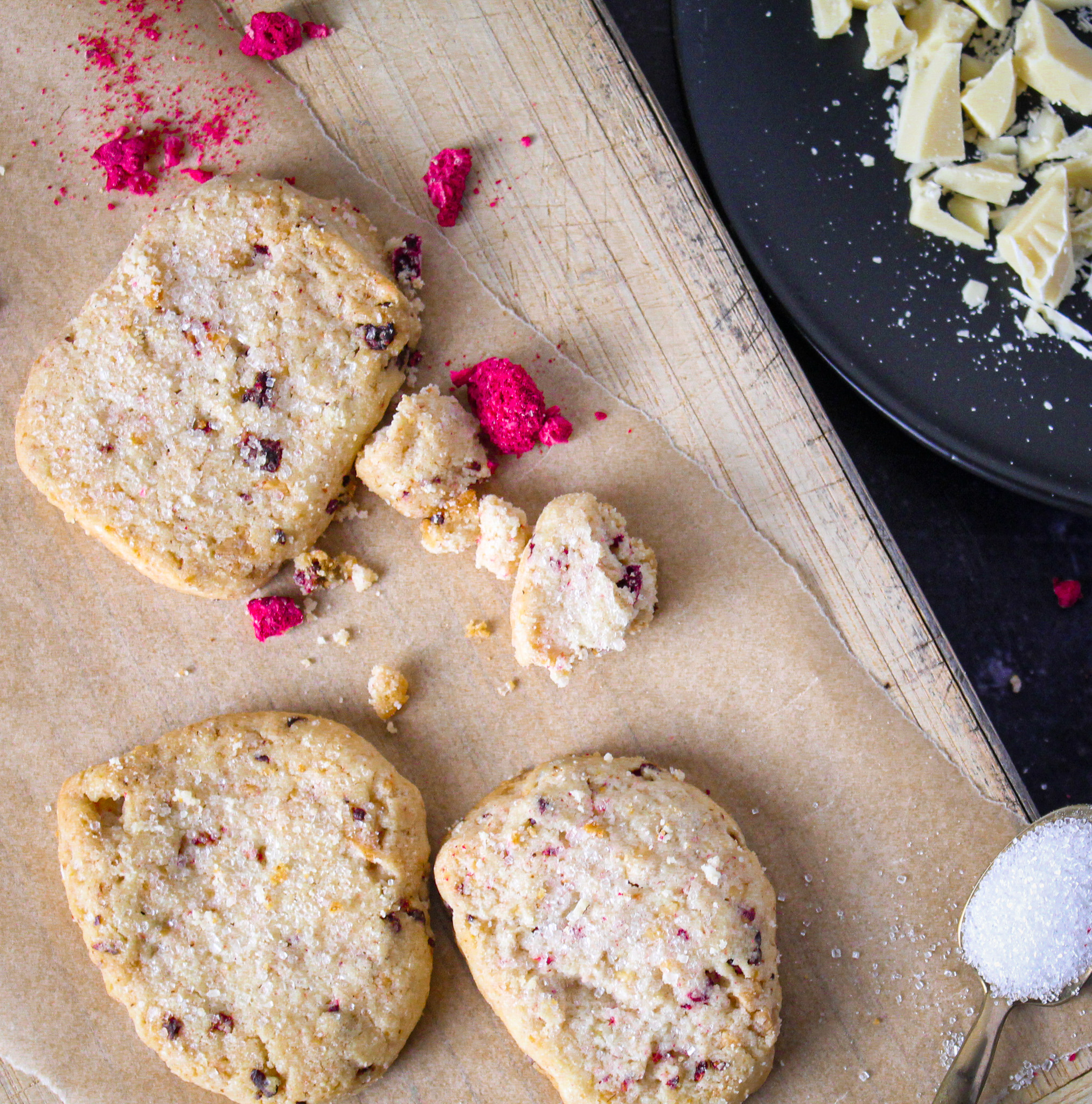 sliced cookies with red raspberries