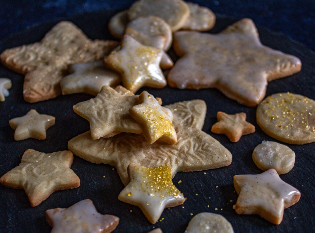 decorated sugar cookies with edible gold glitter.