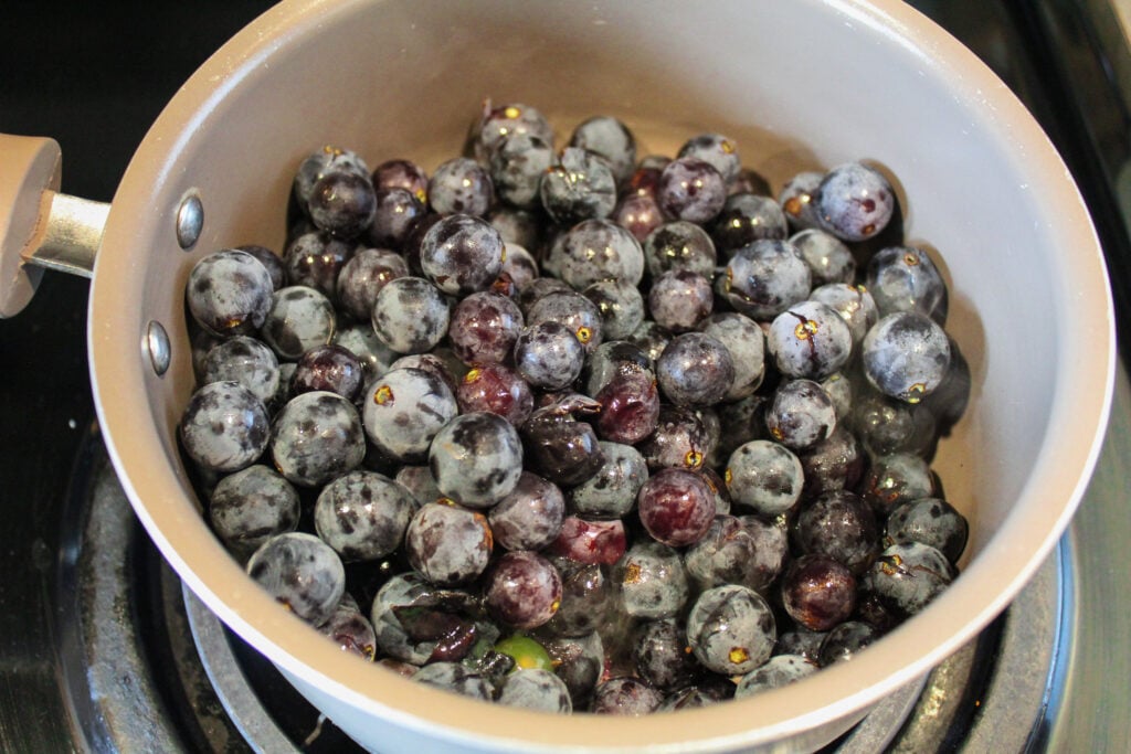 Stewed fruit cooking gently in a saucepan