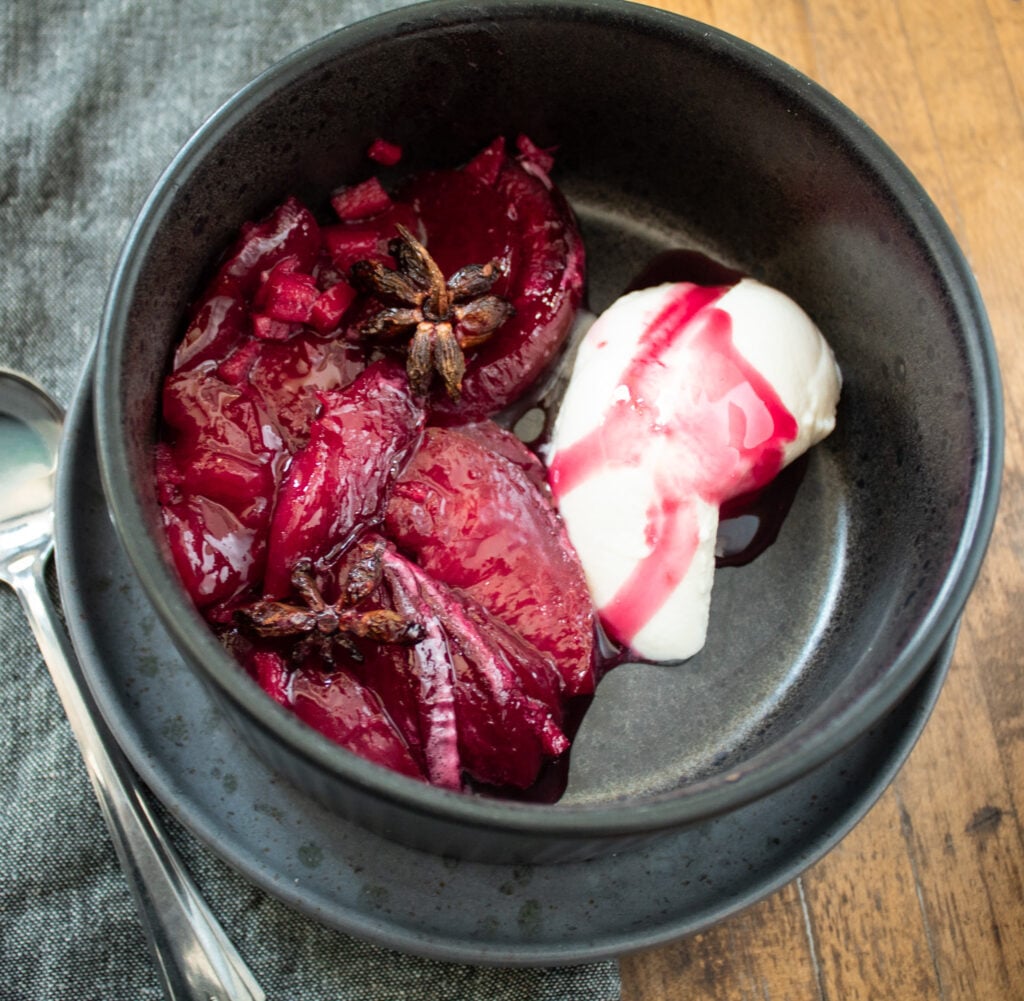 Stewed black plums for yogurt bowls.