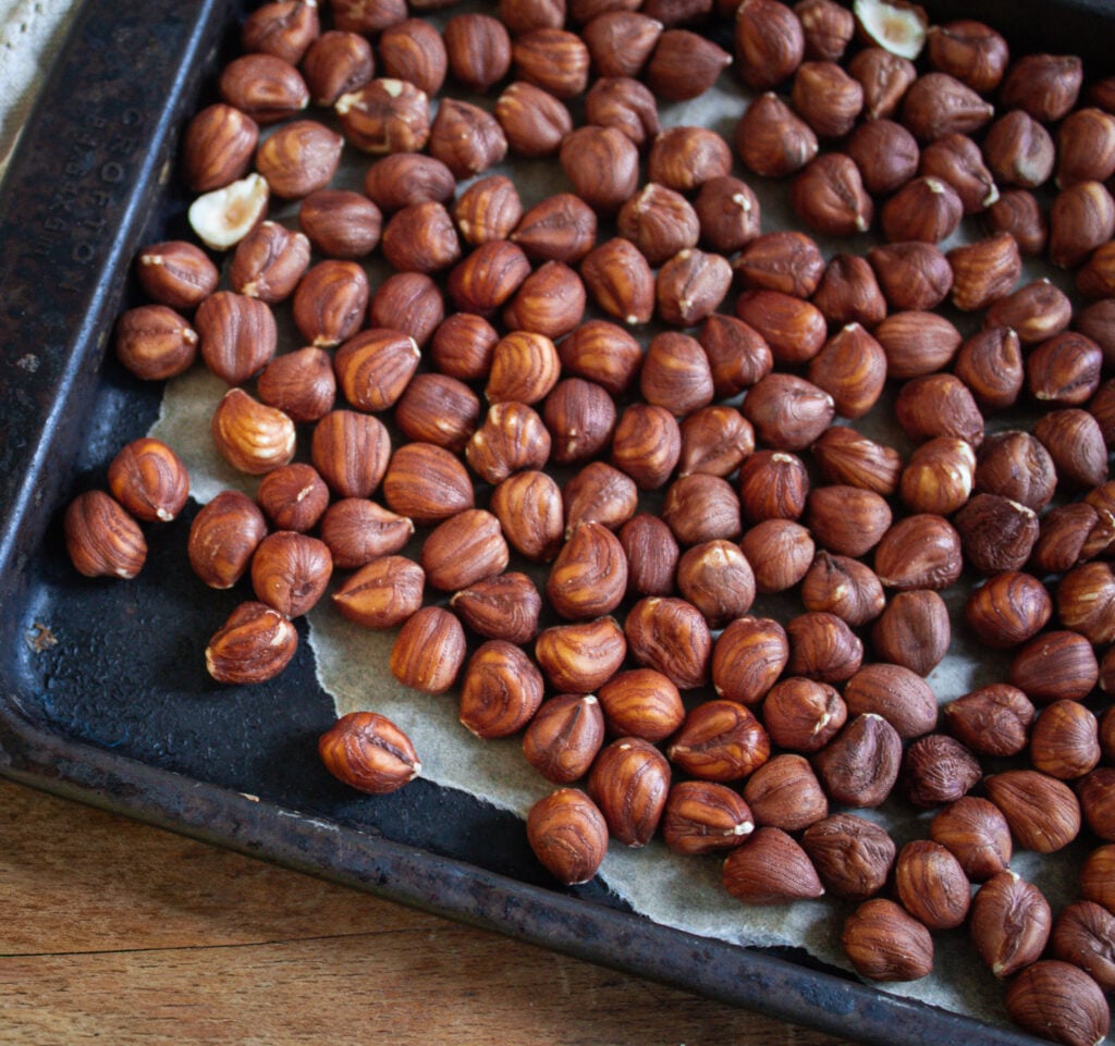 Roasted Hazelnuts for a crunchy garnish on escarole, white bean and mushroom soup.
