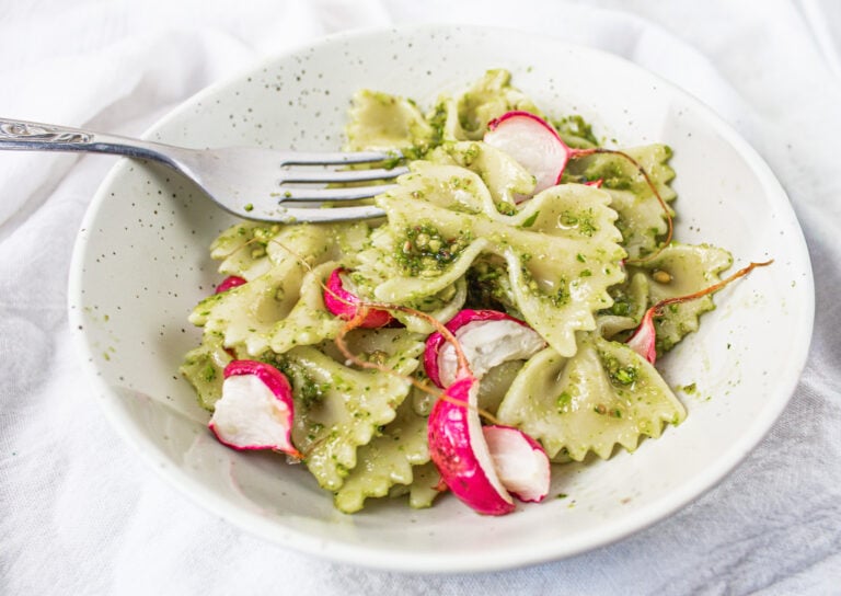 farfalle pasta with pea shoot pesto and roasted radish.
