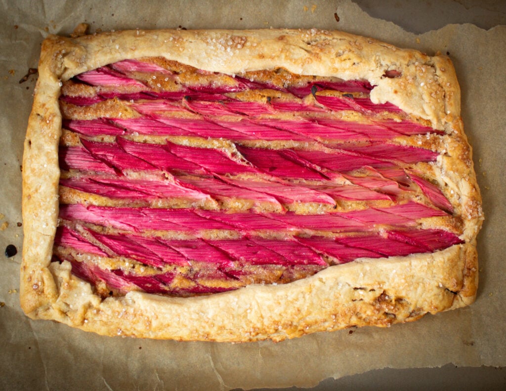 rhubarb galette on parchment paper.